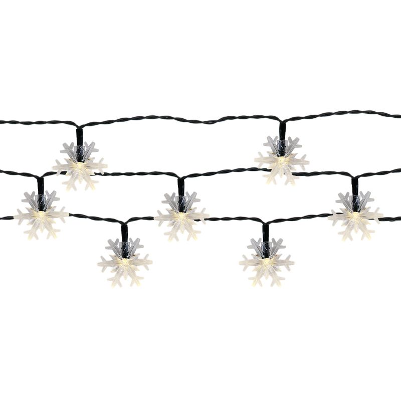 Luminária de jardim solar em formato de floco de neve com 50 LEDs brancos quentes.